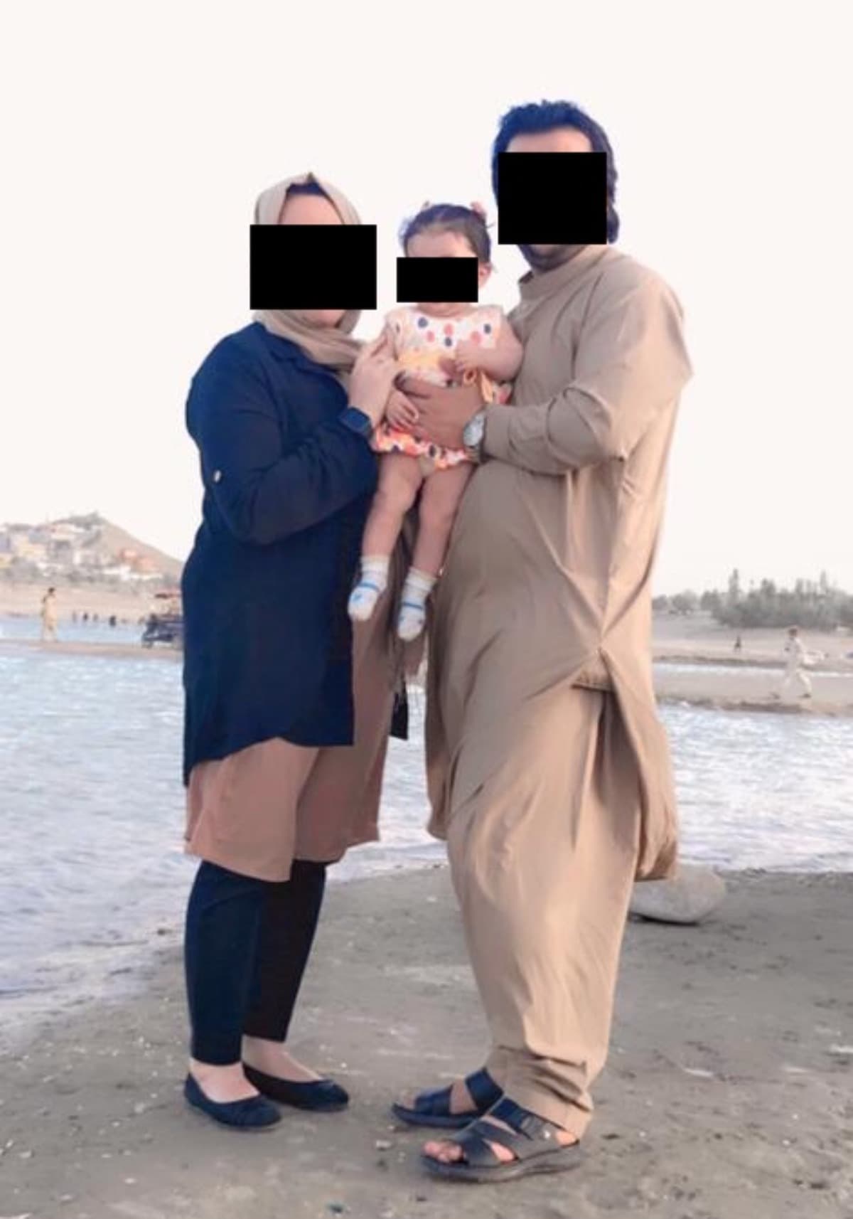 ResettleAfghanWomanAndFamily